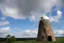clouds behind a windmill